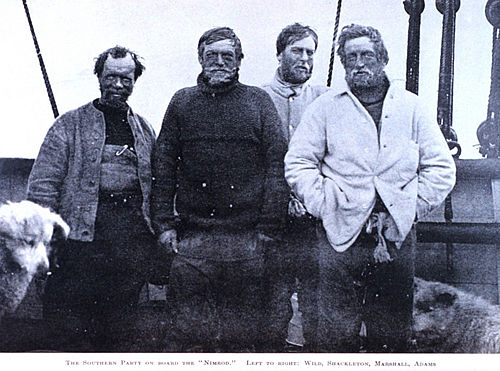 Shackleton (third from left) and three of his crew members during their trek to the "snowy south."