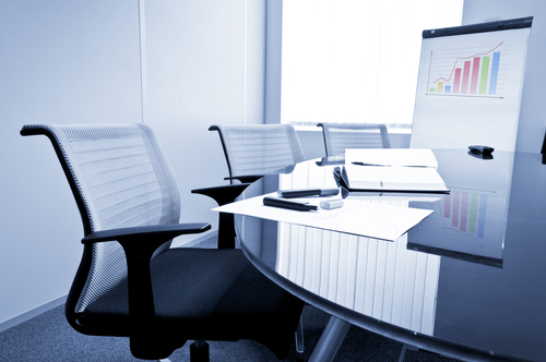 Boardroom with Chairs and Chart